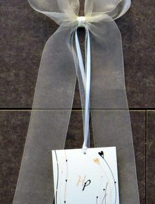 Autoschleife für eine Vintagehochzeit in den Farben creme, braun und apricot.