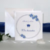 Hochzeitseinladung "Blumenkranz" blau