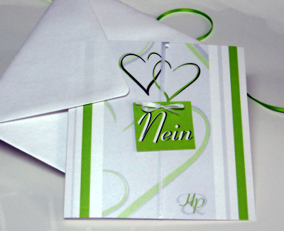 Besondere Hochzeitseinladung in grün und weiß.