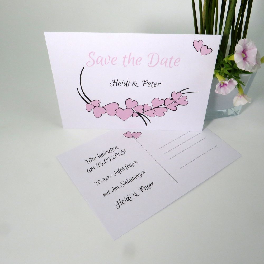 Liebliche Save the Date mit rosa Herzen und modernen Schriften.